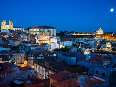 famous-view-porto-by-night-with-moon-portugal-europe_268835-3495